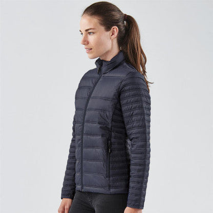 Navy blue quilted puffer ladies basecamp thermal jacket with high collar and zippered pockets ideal for workwear and uniforms