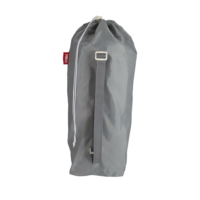 The Nuby Pop Up Booster Seat | Grey is shown against a white background in a gray drawstring duffel bag with a side strap and red seam tag, ideal for carrying this portable baby or travel booster seat.