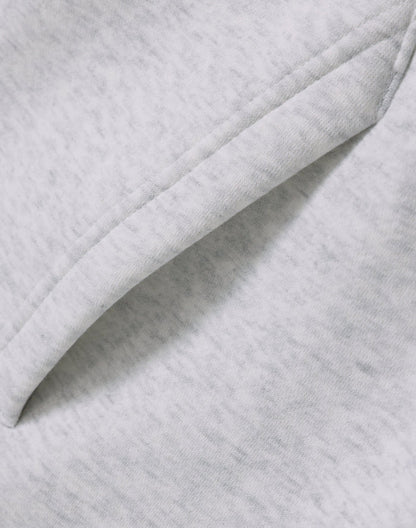 Light gray heathered fleece fabric with visible stitching on premium oversized white marle hoodie for workwear uniforms