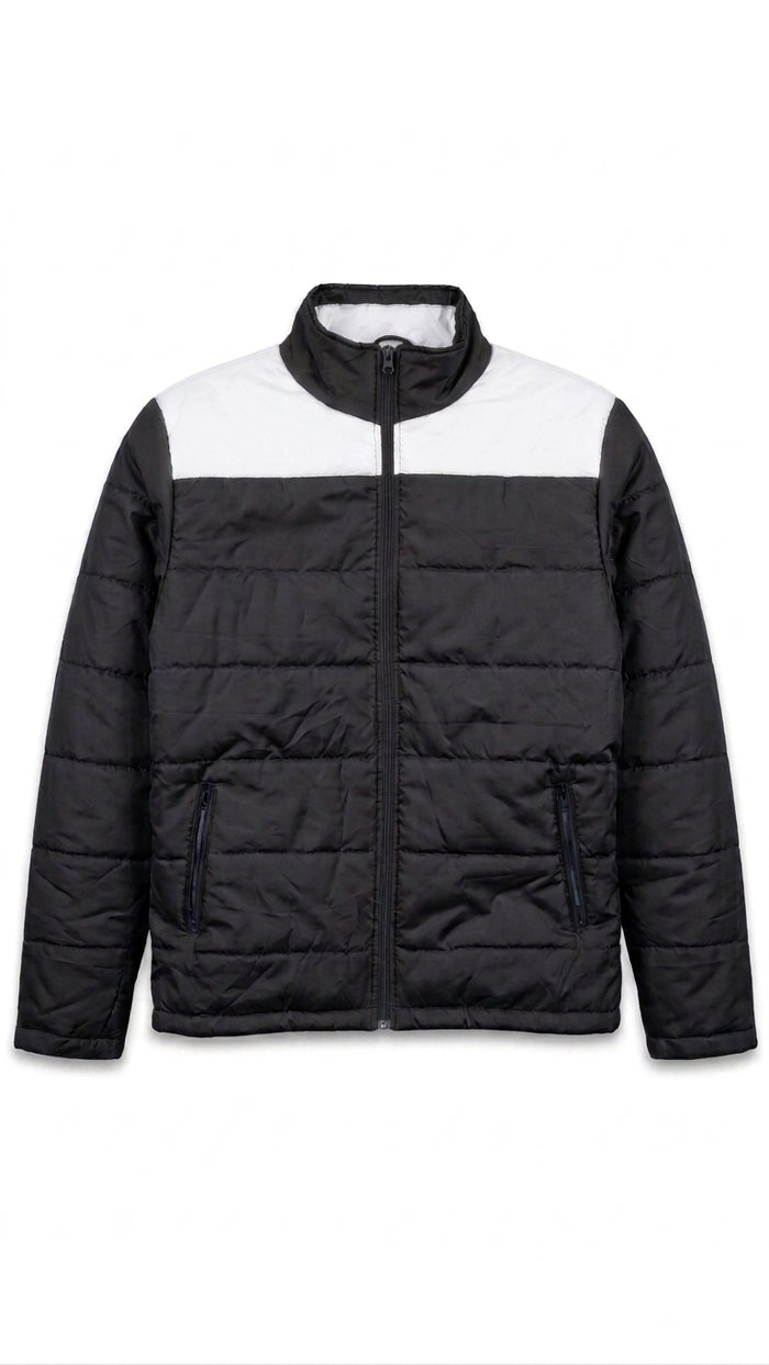 A black and white colorblock puffer jacket with a full-zip front, stand-up collar, and zippered hand pockets, shown against a plain white background.