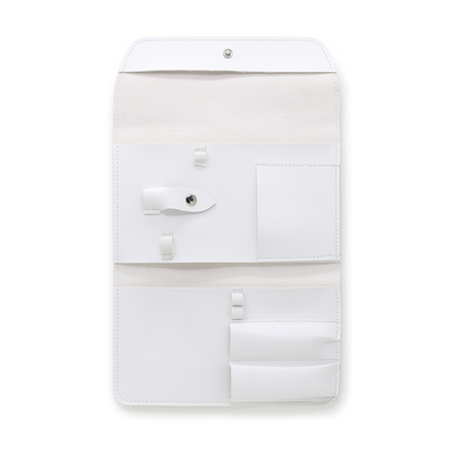White manicure tool case open showing empty tool pockets and pouch