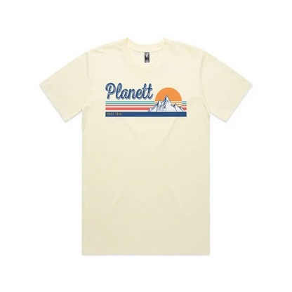 Cream-colored t-shirt with a mountain graphic.