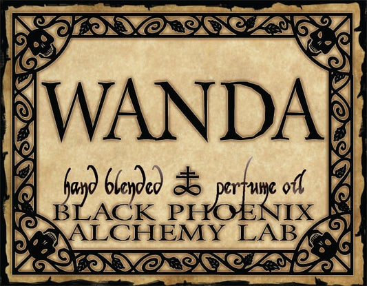 Label for 'Wanda' hand blended perfume oil by Black Phoenix Alchemy Lab with decorative border.